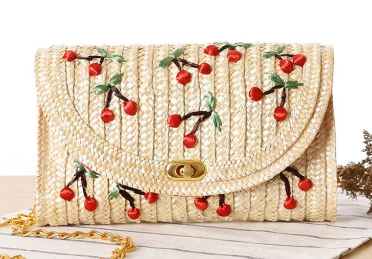 Vintage style women's summer straw clutch with cherry pattern