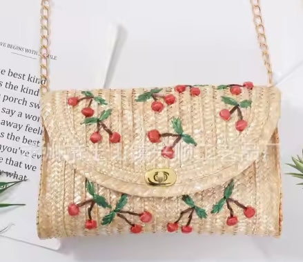 Vintage style women's summer straw clutch with cherry pattern